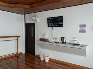 a kitchen with a counter and a counter top at ม่อนทับเบิก รีสอร์ท ภูทับเบิก in Ban Maeo Thap Boek +31 photos