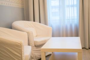 Postel nebo postele na pokoji v ubytování Boutique Hotel Kugel Wien