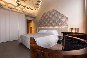 Una cama o camas en una habitación de Hotel Liassidi Palace