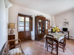 a dining room with a table and chairs at Mansion in Citerna with Pool & Garden in Citerna