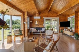 a living room filled with furniture and a flat screen tv at G256-Lemvig-Bellisvej-56 in Lemvig