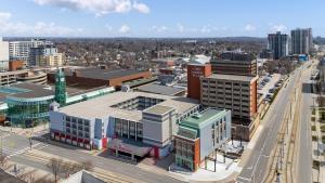 an overhead view of a city with buildings and a street at Crowne Plaza Kitchener-Waterloo by IHG in Kitchener