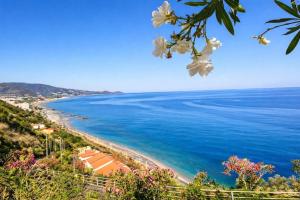 a view of a beach and the ocean at Vista Isole Eolie in Piraino