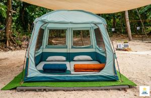 a tent with seats in it on the beach at Point Calixto beach front hut, Boracay in Boracay