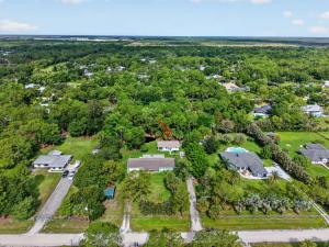 an aerial view of a home with trees at Abi's House - Private Jupiter Escape in Jupiter