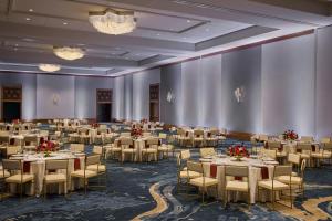 a large banquet hall with tables and chairs at JW Marriott Austin in Austin +162 photos
