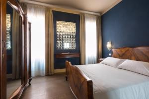 Una cama o camas en una habitación de Hotel Liassidi Palace
