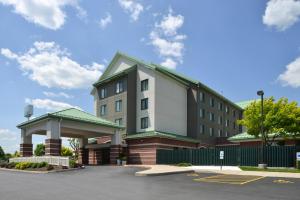 a building with a gazebo in a parking lot at Holiday Inn Express Breezewood by IHG in Breezewood