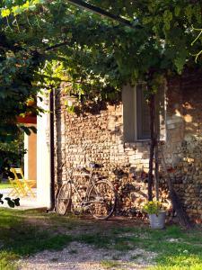 a group of bikes parked next to a brick building at Ca' Dei Molini in Gruaro