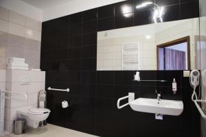 Kúpeľňa v ubytovaní Hotel Cztery Pory Roku