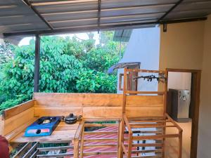 a room with a bunk bed and a stove at Lavera hideout in Dickwella