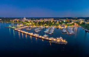 an aerial view of a marina at night at 539 Bay St ⁀➷ 3BDR Lake View Penthouse Condo on West Bay ➠ 401W in Traverse City