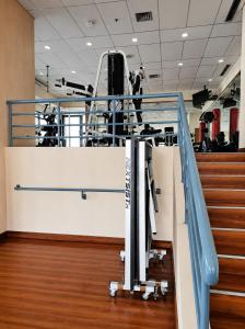 a gym with a slide in a room at Grand Tropic Suites Hotel in Jakarta +76 photos