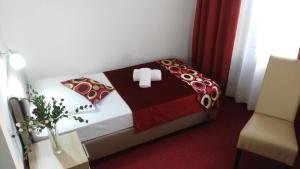 Letto o letti in una camera di Hotel N