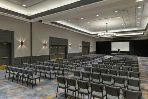 a large room with rows of chairs and a screen at Sheraton Boston Hotel in Boston +102 photos
