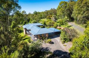 an overhead view of a house with a blue roof at Twilight Ridge in Bega