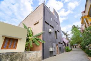 an external view of a building at FabHotel Mara Residency in Chennai