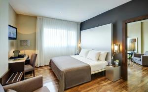 Llit o llits en una habitació de Sercotel JC1 Murcia