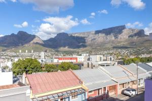 a view of a city with mountains in the background at Royva Bo-Kaap in Cape Town