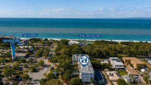 an aerial view of the beach and the ocean at Whispering Waves On Boyd in Woorim