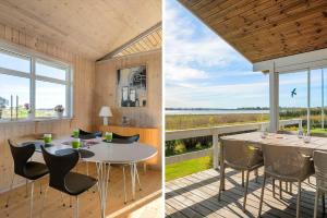a room with a table and chairs and a view of the ocean at FJ1601-Jaegerspris-Strandleddet-25 in Jægerspris