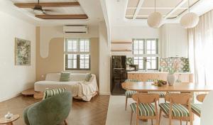 a living room with a table and a couch at VILLA NOVAWORLD PHAN THIET Beach in Phan Thiet +84 photos