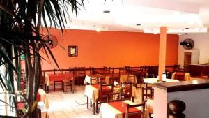 En restaurang eller annat matställe på Hotel Jardin del Lago