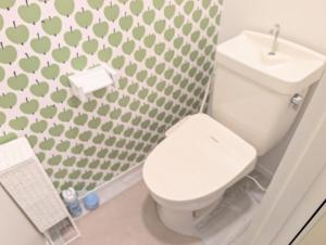 a bathroom with a white toilet and a sink at Maison New River B-203 in Chiharachō +66 photos