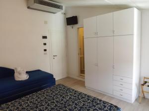 Postel nebo postele na pokoji v ubytování Hotel Vasco