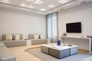 TV a/nebo společenská místnost v ubytování Hotel Di Varese
