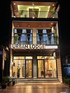a building with a sign that reads urban lodge at The Urban Lodge in Goriān