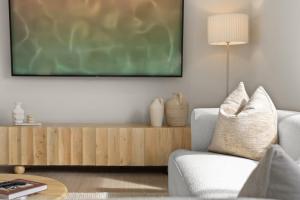a living room with a green chalkboard on the wall at Blue Gum Hideaway Pet friendly Fire Pit in Coolum Beach