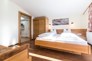 Katil atau katil-katil dalam bilik di Aparthotel Hohe Brücke