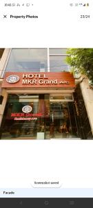 a store with a sign that reads motel must grand ape at MKR GRANd in Rāmeswaram