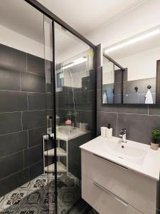 a bathroom with a sink and a mirror at Casa Sofisa in Fundata +49 photos