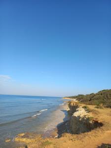 a view of a beach with the ocean at Domaine jard mer in Jard-sur-Mer