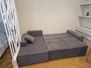 a small bed in a room with a staircase at Sea Breeze Vibe in Nardaran +16 photos