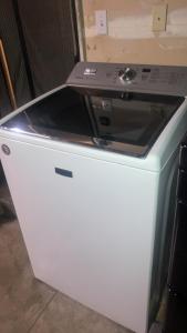 a stove top oven sitting on top of a refrigerator at Philomath place in Philomath