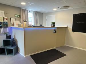 an office with a counter and a desk at Bodo Motel Norway in Bodø