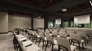 an empty room with chairs and tables and screens at Mariental Hotel & SPA in Szklarska Poręba +84 photos