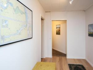 a large map hanging on a wall in a hallway at Vedersø Holiday Center in Ulfborg