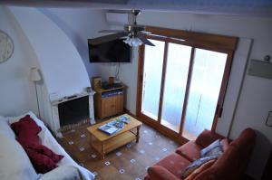 a living room with a couch and a table at Costahispania 308 in Gran Alacant
