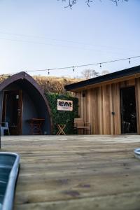 a building with a sign that reads preserve on it at Revive Wellness Pods in Rostrevor