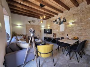 a camera on a tripod in a living room at Arsos Nest in Arsos