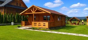 a small cabin in the yard of a house at Witówka Bieliny in Bieliny