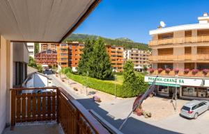 a balcony with a view of a city at Spacious Apartment in Lens with Mountain View in Lens