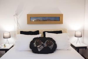 a bedroom with a dog pillow on a bed at Thalgiron, a breath away from Delphi in Ámfissa