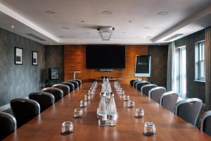 a large conference room with a long table and chairs at Rookery Hall Hotel & Spa in Nantwich +94 photos