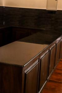 a wooden counter top in a kitchen at Parrot Perch Villa Dickwella in Dickwella