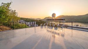 a view of a balcony with a view of the mountains at Gapyeong Boreum-Dal Poolvilla in Gapyeong
